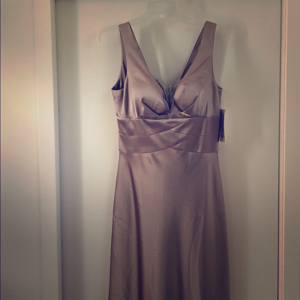 Flattering gown, new, size 10